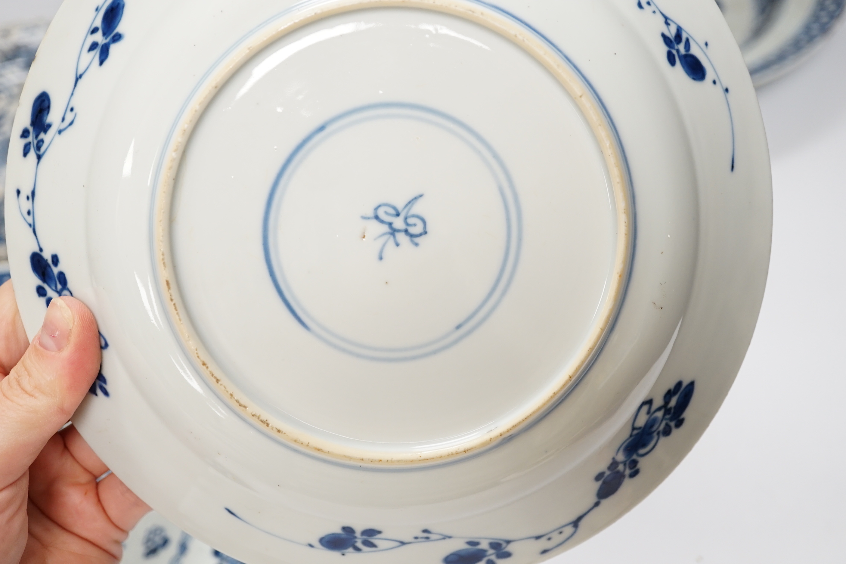 Six 18th century Chinese blue and white dishes and plates, largest 23cm diameter